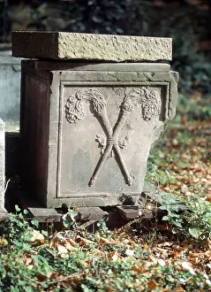 Gravestone fragment with torches