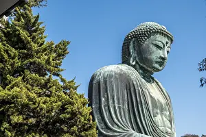 The Great Buddha of Kamakura under a blue sky
