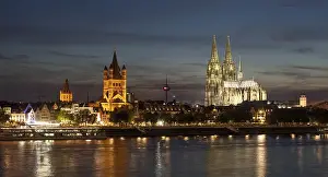 Great St. Martin Church with Cologne Cathedral at dusk