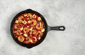 Greek saganaki, in an iron pan