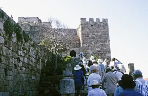 Greek tourist group visits the historic Crusader castle, Byblos, Lebanon 1998