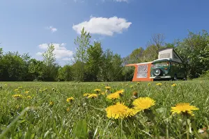 Green classic mobil home at campground