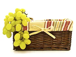 Green Grape In Handmade Basket For Food Against The White Background