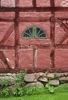 Framed Print : Green window in a wall in a red half-timbered house in Den gamle by