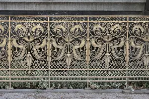 Grid with art nouveau ornaments on the relief sleep by Bernhard Hotger in the plane tree grove