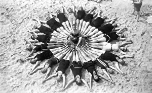 Group with bathers on the beach
