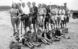 Group with bathers on the beach