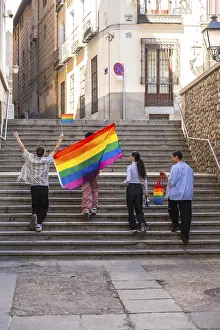 Group of diverse friends celebrating pride