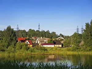 Group of houses in the forest near the river