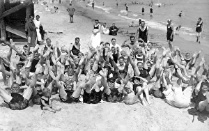 Group of people waving their feet in the air