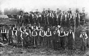 Group picture, construction workers with shovels