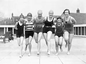 Group of woman in swimwear on a jetty