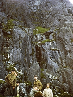 Group of young male climbers standing on rocks, probably North Wales, Great Britain, around 1958