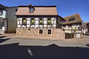 Half-timbered house, street of concrete paving stones