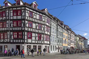 Half-timbered houses on Cathedral Square with blue sky in the background
