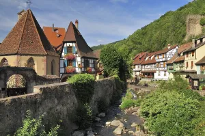 Half-timbered houses on the Weiss river in the town of Kaysersberg