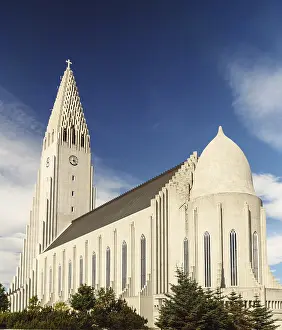 Hallgrimskirkja Cathedral in Reykjavik on a sunny summer day with a blue sky (seen from the backside)