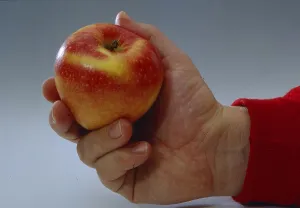 Hand with apple