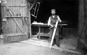 Handicraft, carpenter in front of the workshop
