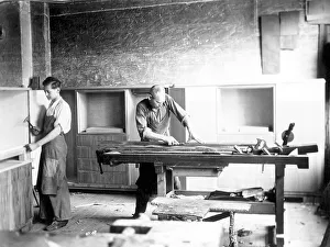 Handicraft, two carpenters working in a workshop