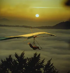Hang-glider in the sundown, sunset