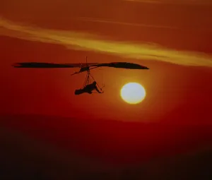 Hang glider in the sunlight