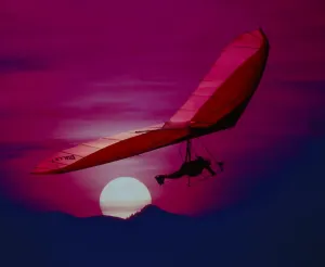 Hang glider in the sunlight