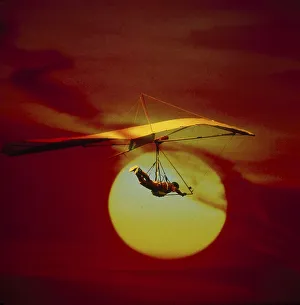 Hang glider with sunset