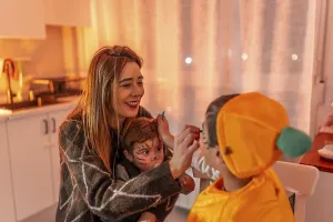 Happy family preparing for halloween party