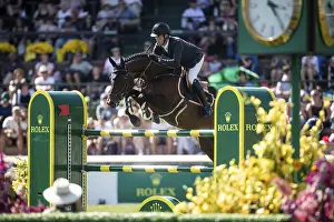 Harrie Smolders of The Netherlands and riding Uricas V/D Kattevennen compete in the first round of the 1
