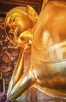 Head of the Reclining Buddha in a temple in Bangkok
