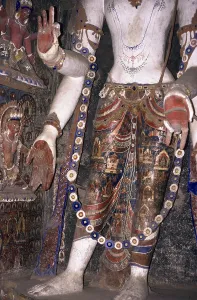 Headless statue of lord Buddha in 11th century in old gompa at Alchi
