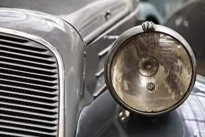 Category Oldtimer Prints: Headlight of old vintage car close-up