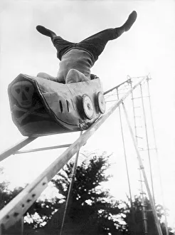 Headstand on roller coaster, ca