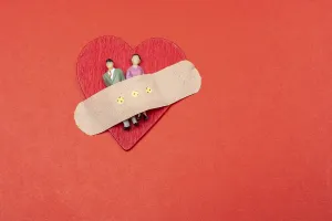 Heart with man and woman figurines
