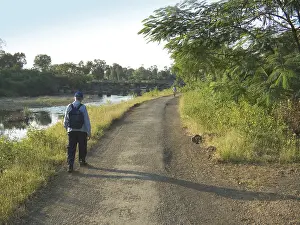 Hicker walking by the river side