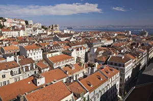 High angle view of buildings with traditional terracotta tiled rooftops in old Lisbon from Santa Justa elevator