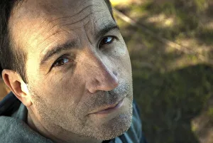 High angle view portrait of an adult man looking at the camera