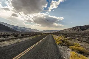 Highway, street with dramatic clouds above
