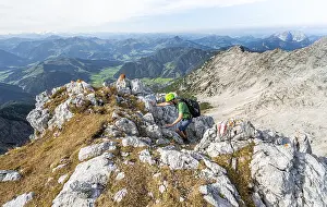 Hiker with climbing helmet, climbing the Mitterhorn
