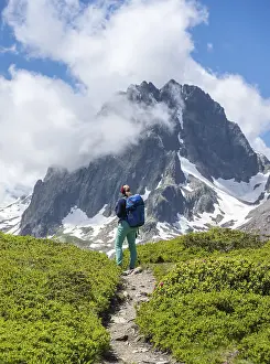 Hiker on a hiking trail, Aiguilette des Posettes