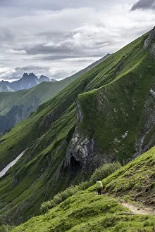 Hiker on a hiking trail, descending from the Rappenseehuette