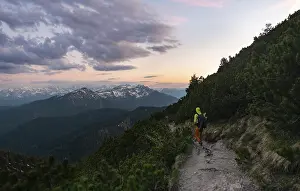 Hiker on the hiking trail to Herzogstand