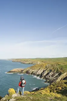 Hiker looking out over the coast