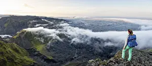 Hiker looks over spectacular landscape