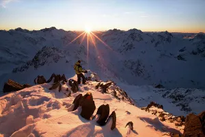 Hiker in the mountains, sunset, Kaunergrad Nature Park, Oetztal Alps, North Tyrol, Austria, Europe