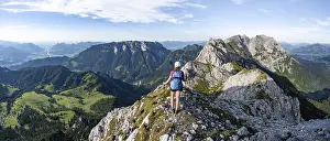 Hiker on a ridge in the mountains