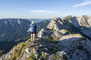 Hiker on a ridge in the mountains