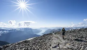 Hikers climbing to the top of Skala