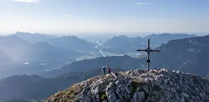 Two hikers at the summit, aerial view